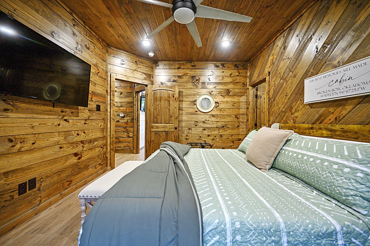 Queen bedroom with TV