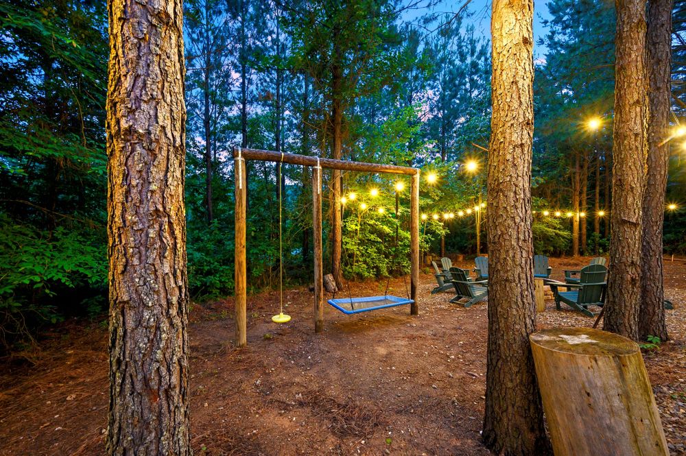 Swings under string lights