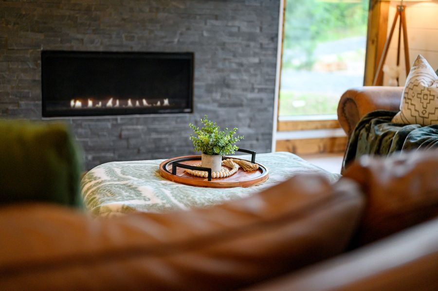 Gas fireplace glowing in the great room